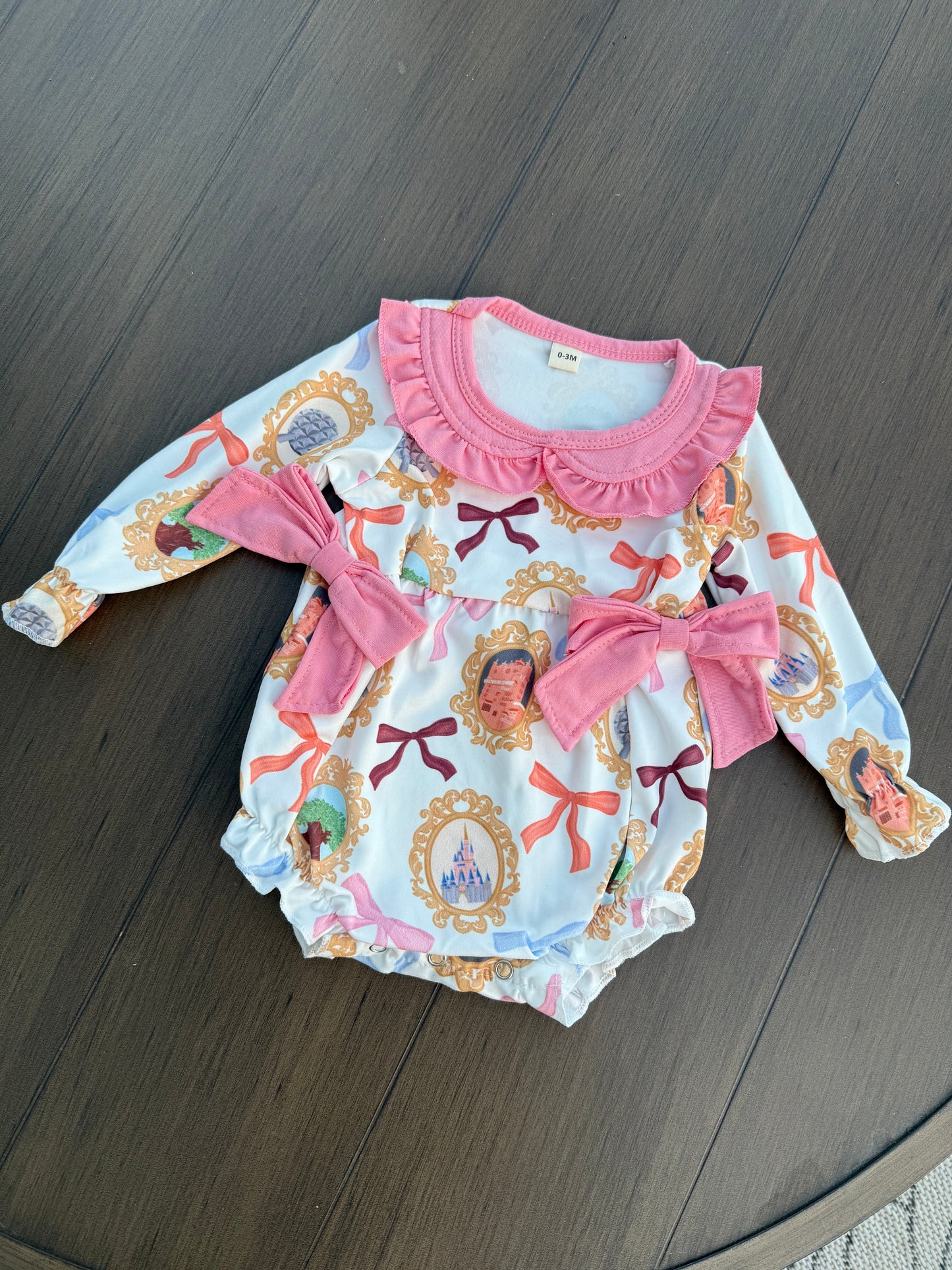 Magic with a Bow Onesie